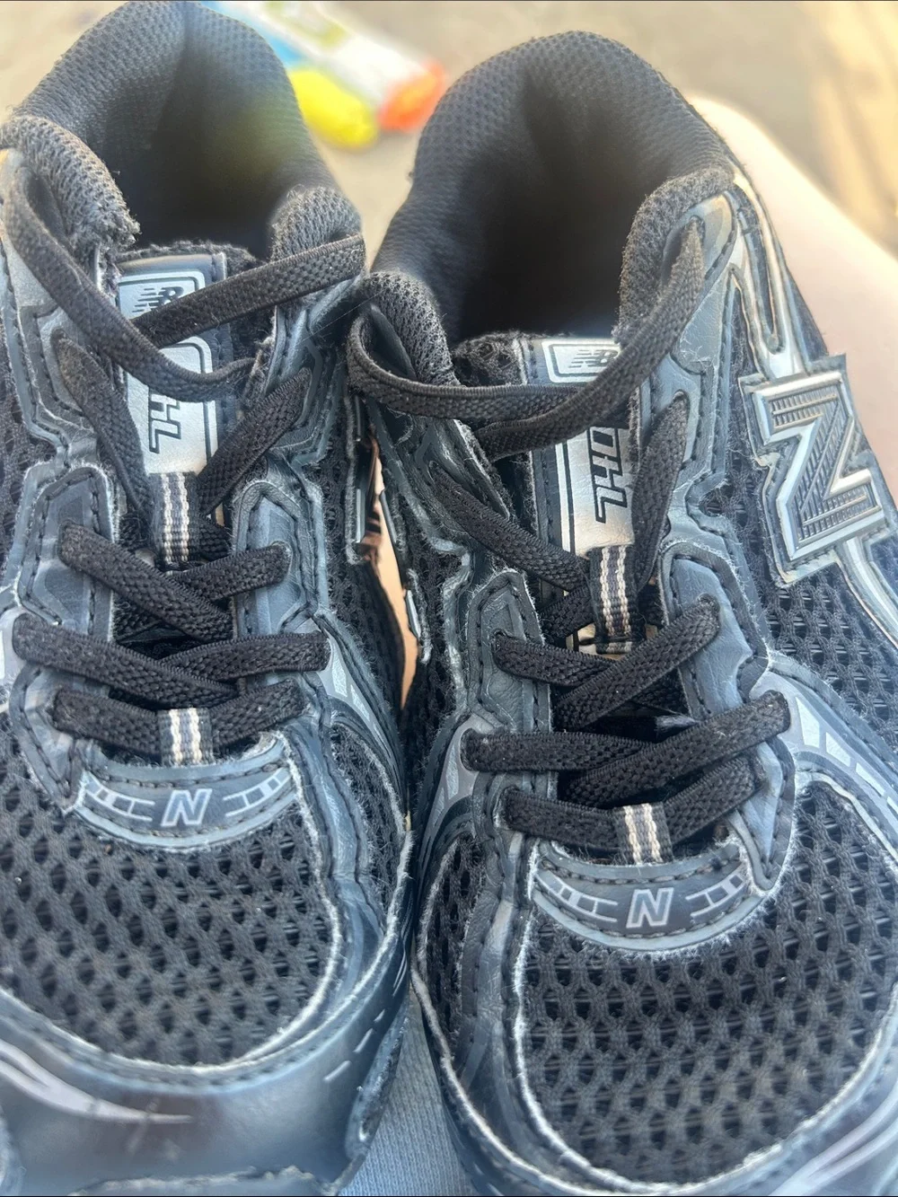 New Balance Kids Black and Silver Athletic Sneaker